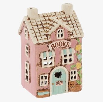 Foto: Husformad keramisk ljuslykta bokhandelshus