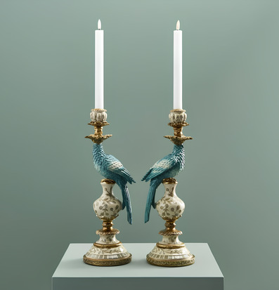 Foto: Turkosa papegojljusstakar med vita kronljus