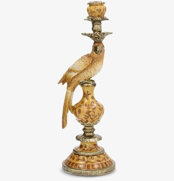 Foto: Skulptural ljusstake med papegoja i saffran