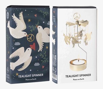Foto: Förpackning med ljusspel och fredsduvor packshot
