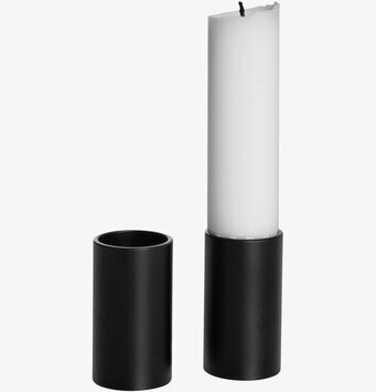 Bild av stilren svart ljusstake med vitt blockljus