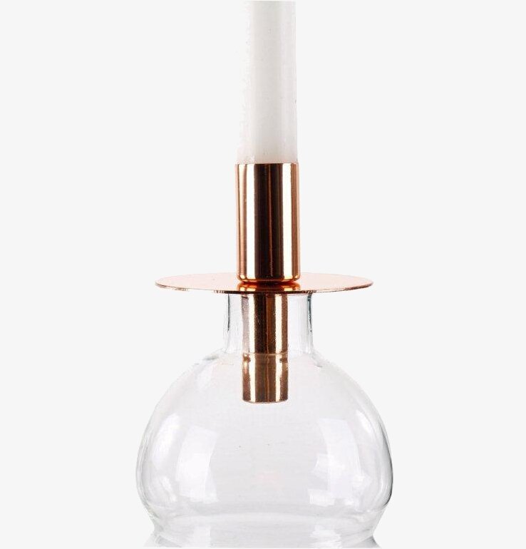 Bild av ljusstake i glas och koppar för stilren inredning