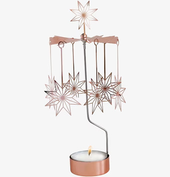 Bild av stort änglaspel med kopparfärg och stjärnmotiv