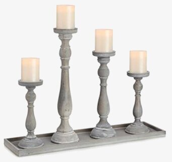 Bild av elegant ljusstake med patina och blockljus