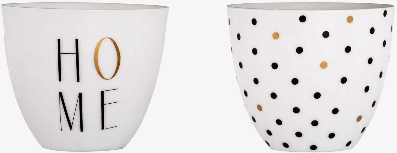 Bild av stilrena ljuskoppar i vit och guld design