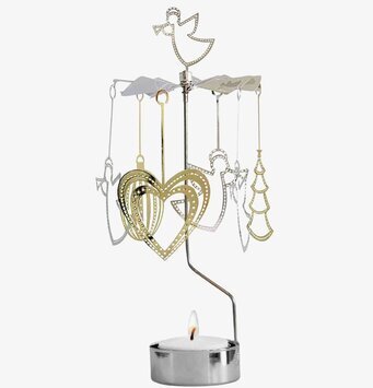 Bild av en elegant ljuslykta med snurrande figurer