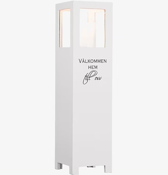 Bild av elegant ljuslykta med välkomnande text