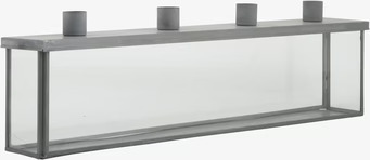 Bild av stilren ljusstake i metall med glasdetaljer