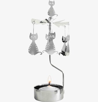 Bild av en charmig ljuslykta med kattformade dekorationer