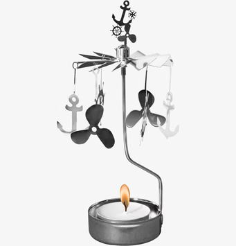 Bild av maritimt ljusspel med eleganta metallfigurer