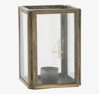 Bild av adventsljusstake i mässing med glasdetaljer