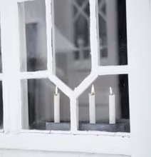 Foto av adventsljusstake i traditionell svensk design