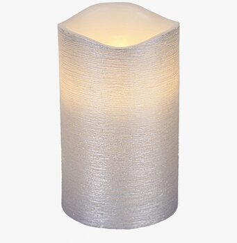 Bild av stilrent vaxljus i silver med unik design